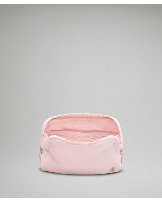 flush pink belt bag lululemon Everywhere (1 L) in Pink, One Size lemon bunny Lululemon Athletica Everywhere Belt Bag