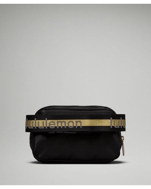 lululemon belt bag black and gold All Night Festival Crossbody 5L and keys Lululemon All Night Festival Crossbody