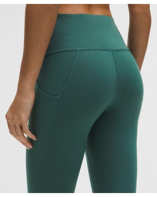 lululemon athletica Green – Wunder Train High-Rise Tight Leggings With Pockets – 25" – – Size 4