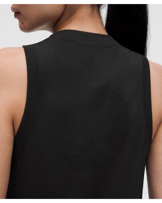 lululemon athletica Black – Swiftly Relaxed Tank Top Hip Length Logo – – Size 4