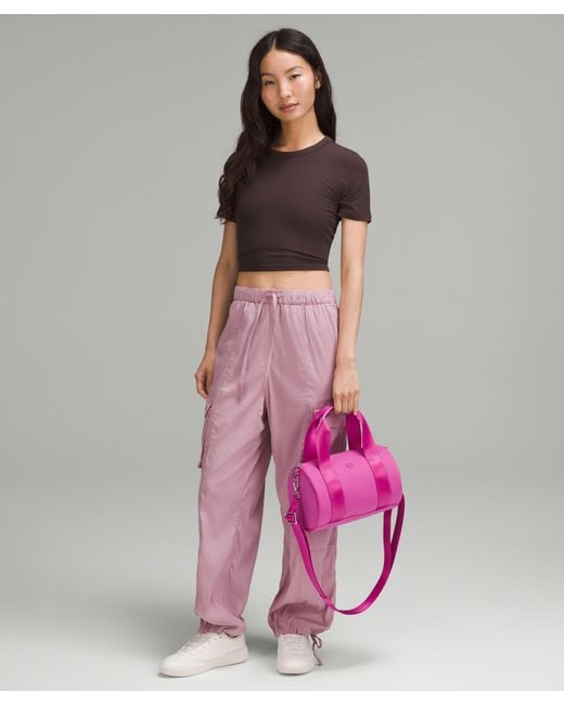 lululemon Knit Nylon Mini Barrel Duffle Bag 5L in Pink | Lyst