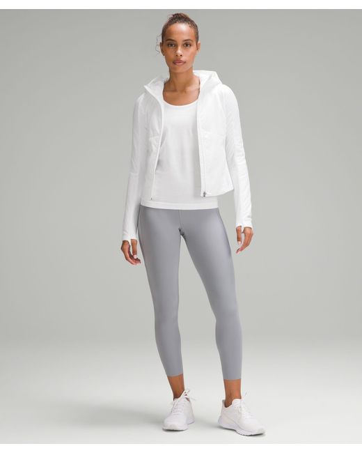 https://cdna.lystit.com/520/650/n/photos/lululemon/bd82a4b3/lululemon-athletica-designer-White-Push-Your-Pace-Jacket.jpeg