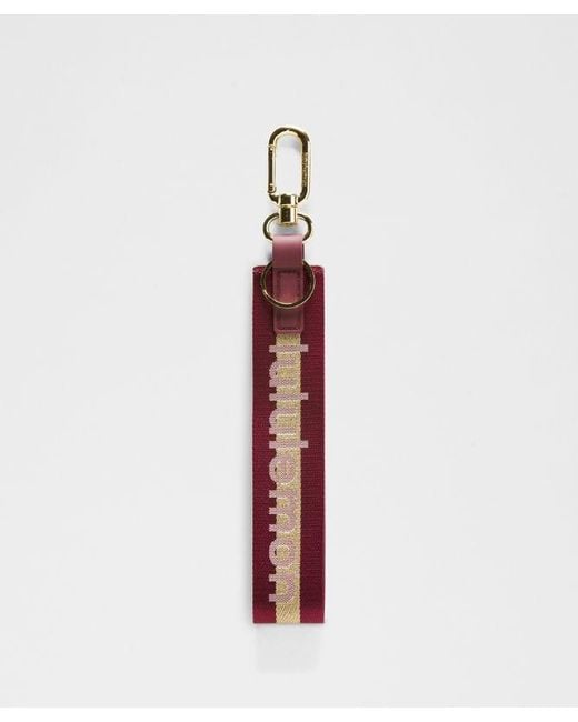 lululemon athletica White – Never Lost Keychain – //Burgundy