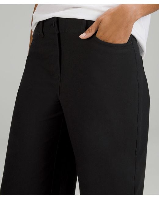 https://cdna.lystit.com/520/650/n/photos/lululemon/cde90d65/lululemon-athletica-designer-Black-City-Sleek-5-Pocket-Wide-leg-High-rise-Pants-Light-Utilitech.jpeg