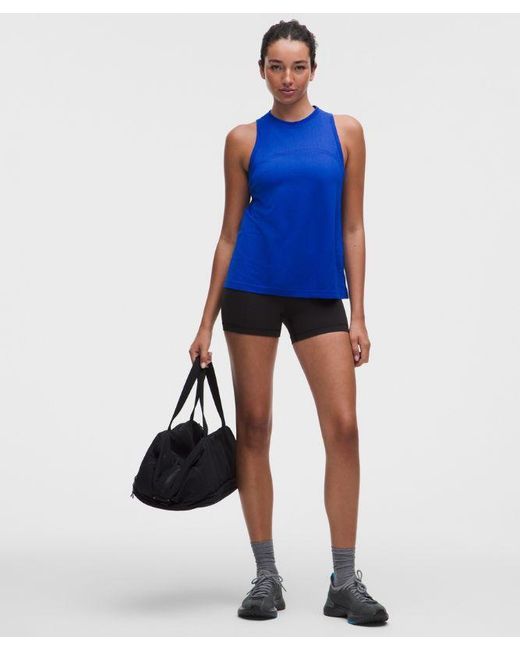 lululemon athletica Blue – Swiftly Relaxed Tank Top Hip Length Logo – – Size 4