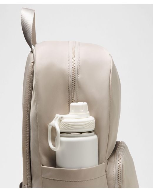 lululemon backpack beige 2-in-1 Convertible 21L With An Internal Laptop Sleeve And Side Water Bottle Pockets Tan Lululemon Backpack