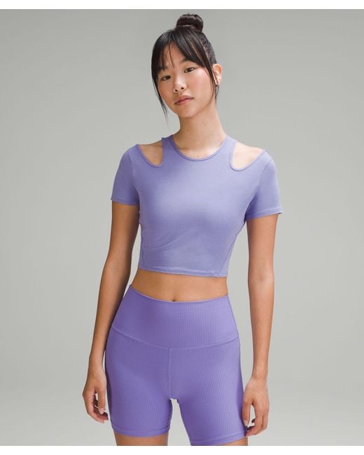 https://cdna.lystit.com/520/650/n/photos/lululemon/eb55996c/lululemon-athletica-designer-Dark-Lavender-Shoulder-Cut-out-Yoga-T-shirt.jpeg