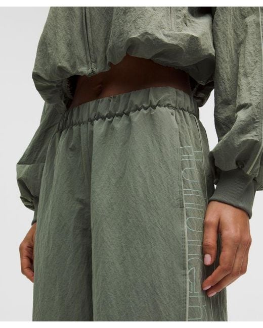 lululemon athletica Green – Crinkle Nylon Mid-Rise Track Pants Wordmark – –