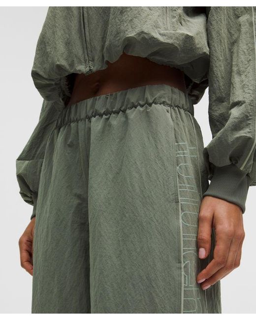 lululemon athletica Green – Crinkle Nylon Mid-Rise Track Pants Wordmark – –