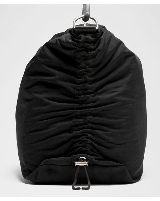 lululemon cross bag black Unisex Convertible Ruched Crossbody 16L while the water lululemon Convertible Ruched Crossbody Bag