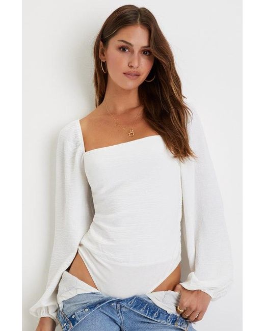 Lulus White Abundance Of Love Textured Long Sleeve Tie-Back Bodysuit