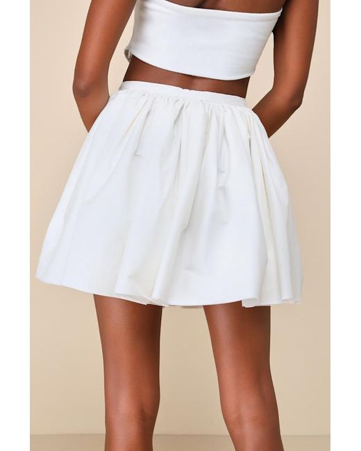 ZEMETA Brown Cha Cha Layered Raw Hem Wrap Mini Skirt