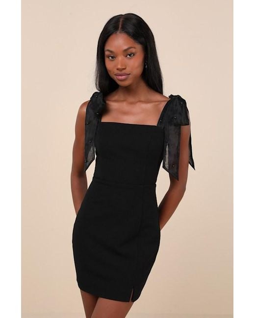 Tie strap black dress deals