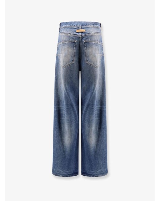 Dior Blue Flared Jeans With Destroyed Effect
