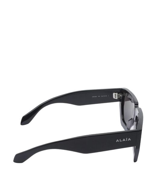 Alaïa Gray Melted Rectangular Sunglasses