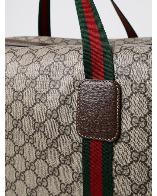 Gucci Brown Gg Supreme Canvas And Leather Duffle Bag for men