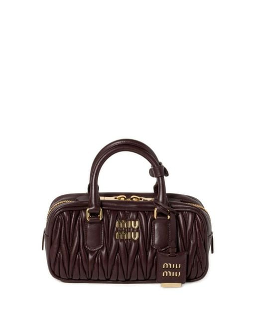 Miu Pochette MatelassÃ© Miu Miu Blue MatelassÃ Leather Frame