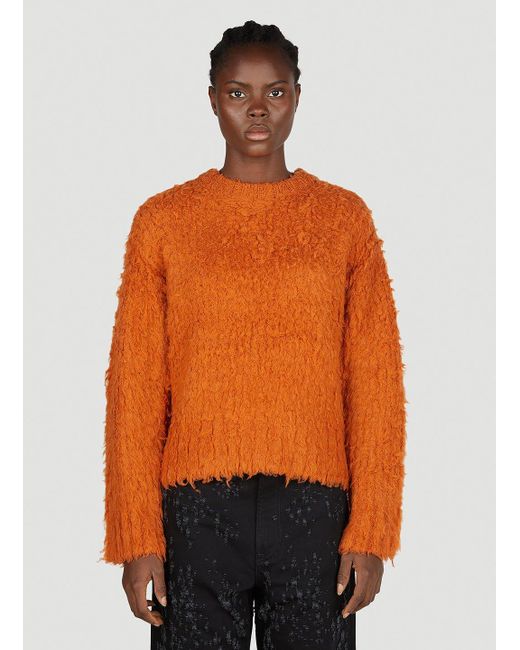 Orange fuzzy sweater deals