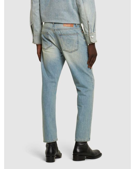 Jeans regular fit in denim di cotone di Valentino in Blue da Uomo