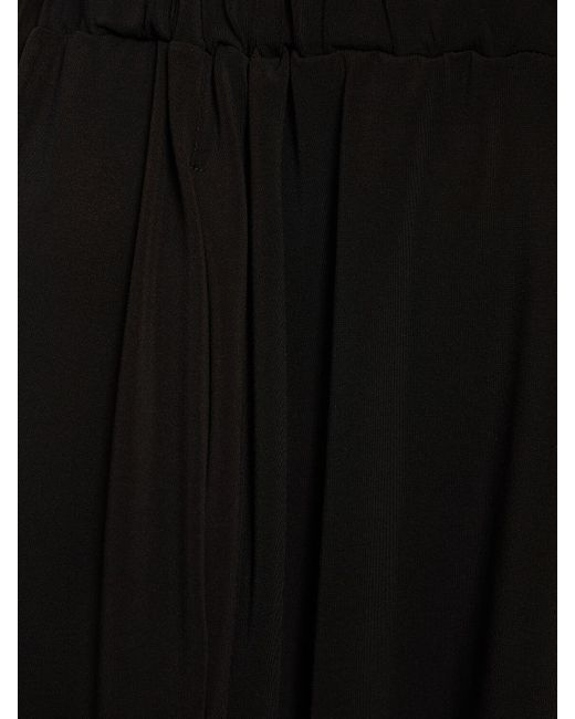 Pantalones anchos de jersey drapeado Issey Miyake de color Black