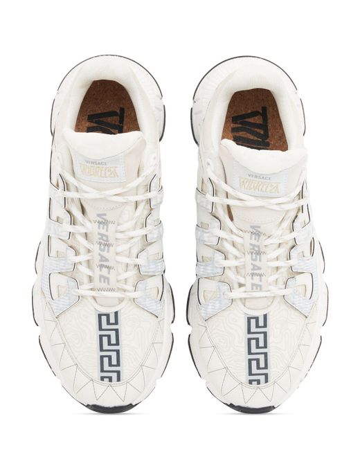 Sneakers de piel Versace de hombre de color White