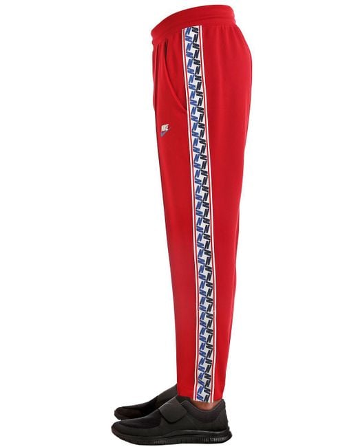 Nike Nsw Taped Poly Pants in Red for Men | Lyst