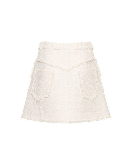 Minifalda de tweed Balmain de color Natural
