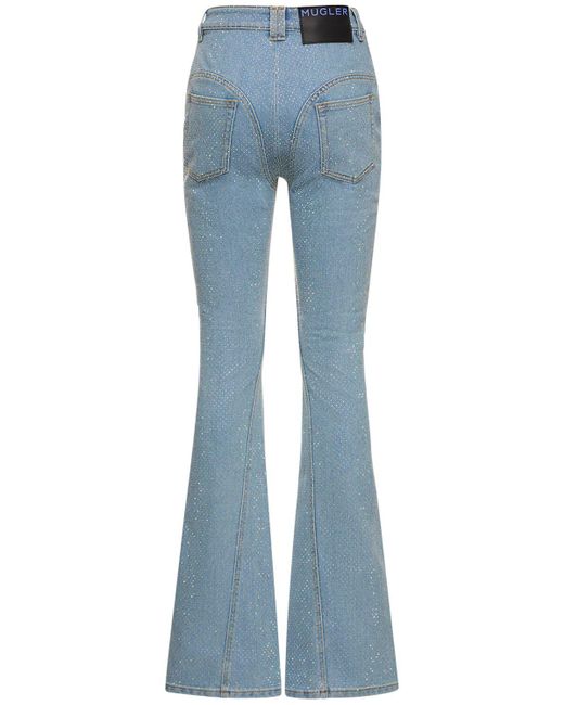 Pantaloni svasati in denim stretch con cristalli di Mugler in Blue
