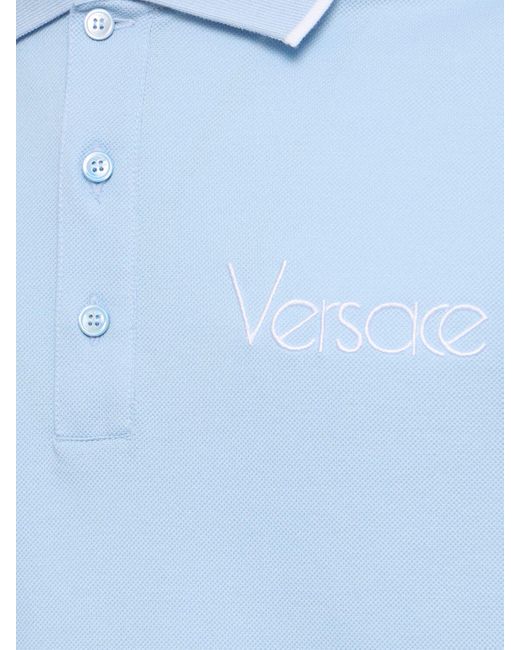 Polo in cotone piqué con logo di Versace in Blue da Uomo