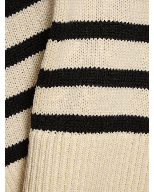 Totême  Natural Signature Wool Blend Turtleneck Sweater