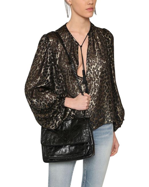 medium niki monogram leather bag