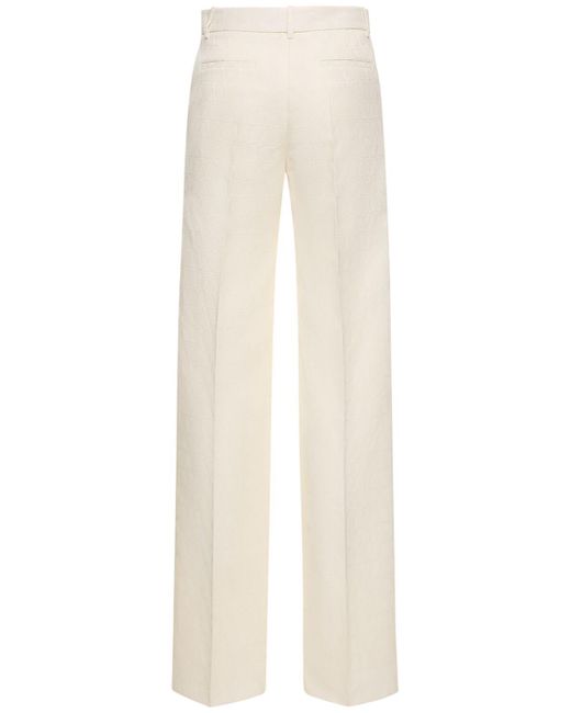 Pantalones rectos de crepé de seda Valentino de color Natural