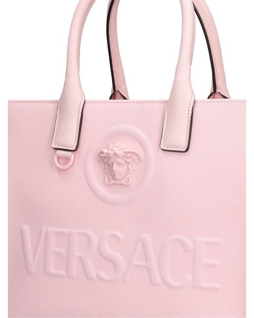 Borsa shopping piccola medusa in tela di Versace in Pink
