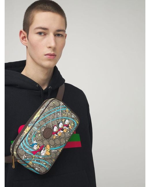 Gucci Leather-trimmed Monogrammed Canvas Belt Bag - Men - Black Bags