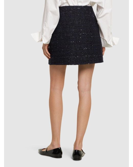 Minigonna in tweed di lurex di Valentino in Black