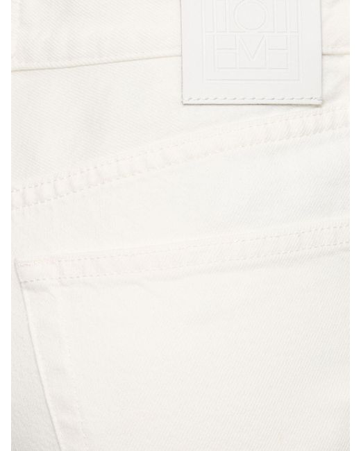 Jeans dritti vita alta in denim di Totême  in White