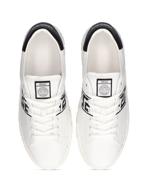 Sneakers in similpelle con logo di Versace in White da Uomo