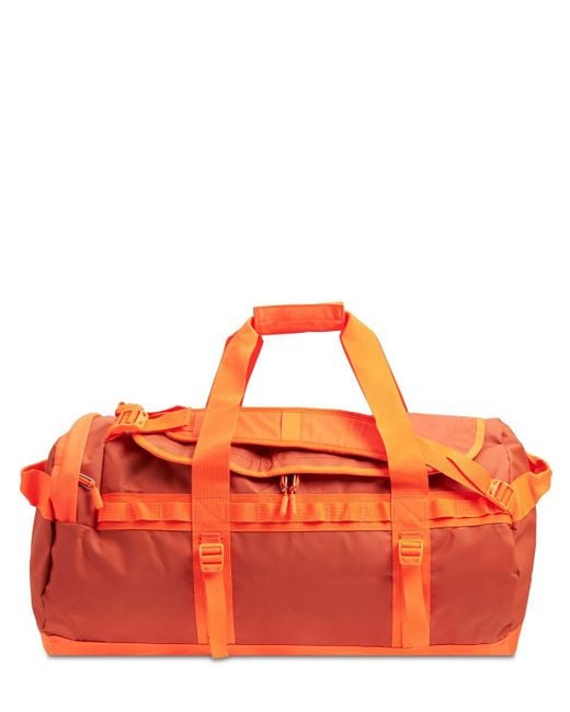 The North Face Orange Base Camp Duffle Bag for men