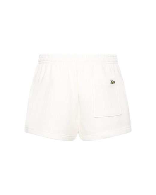 Sporty & Rich White Lacoste Serif Disco Shorts