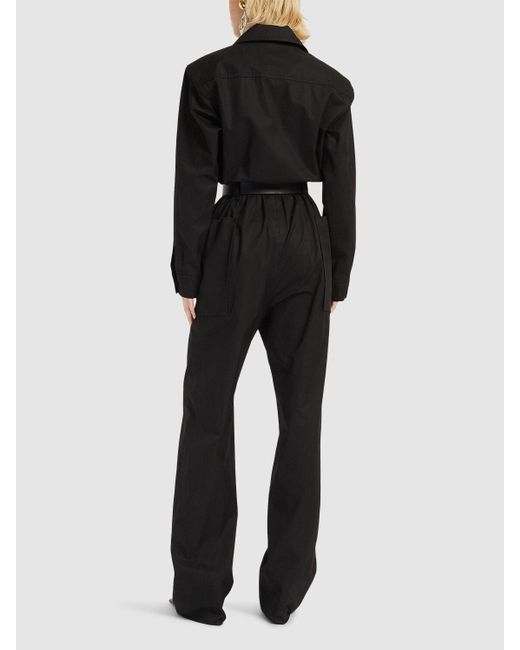 Jumpsuit de sarga de algodón Saint Laurent de color Black