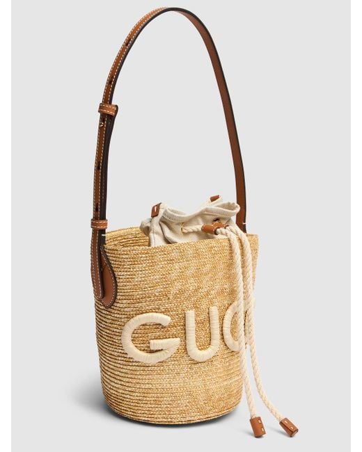 Petit sac porté épaule en raphia à logo Gucci en coloris Metallic