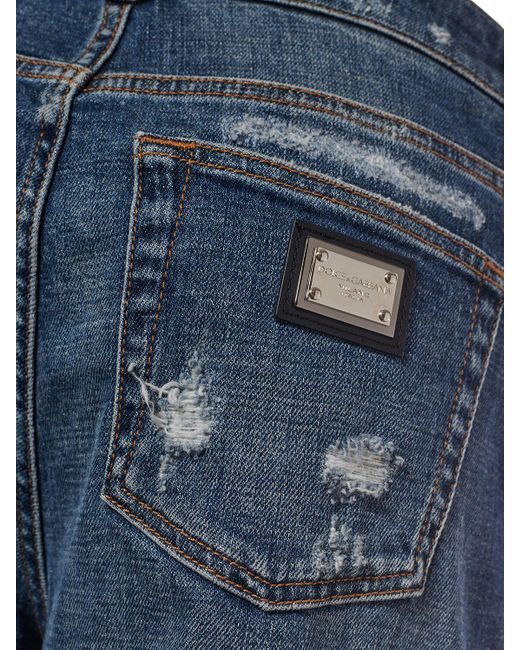 Jeans dritti in denim distressed di Dolce & Gabbana in Blue