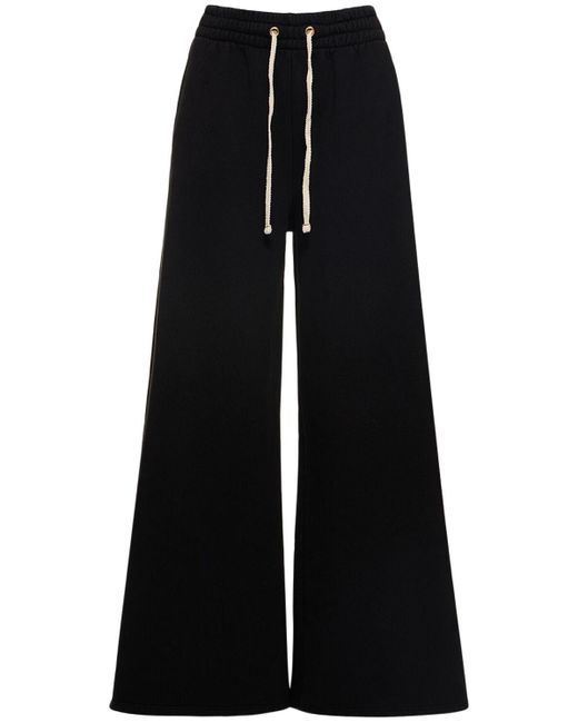 Pantaloni svasati in cotone di Les Tien in Black