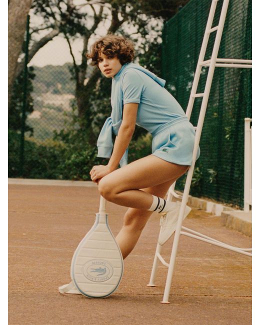 Sporty & Rich Blue Disco-shorts "lacoste Serif"