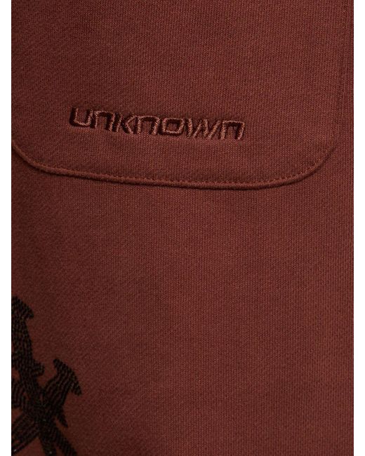 Pantaloni dagger in cotone / strass di Unknown in Red da Uomo