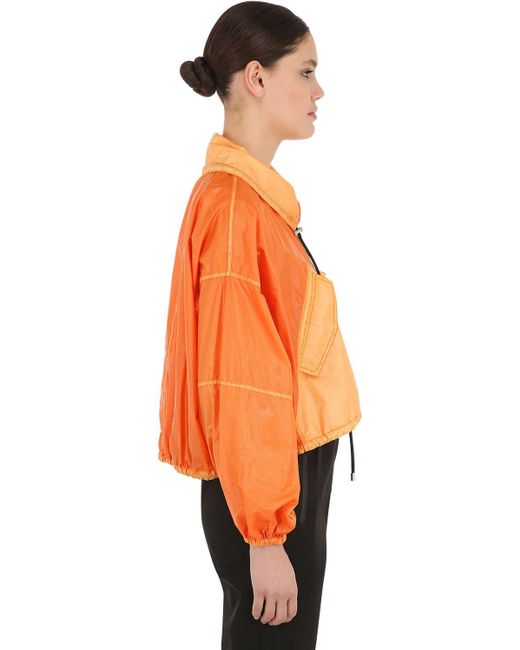 orange cropped windbreaker