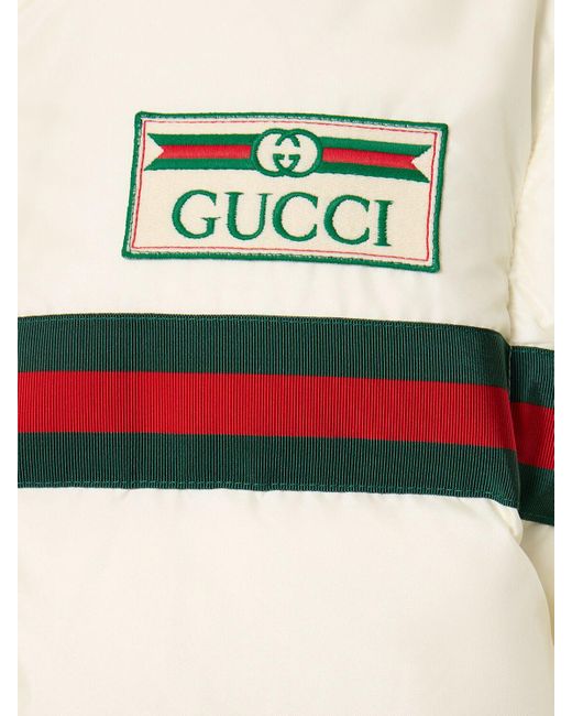 Piumino in nylon con web di Gucci in Natural