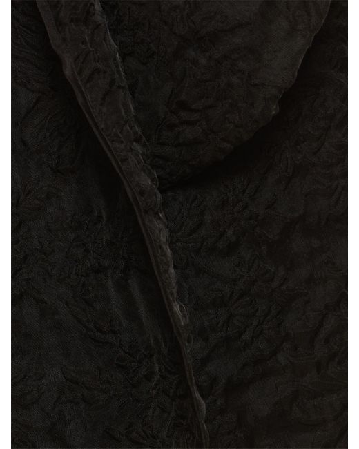Jupe courte matelassée avec nœud gigi CECILIE BAHNSEN en coloris Black