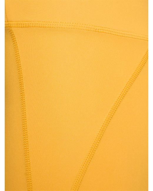 Shorts vita alta in techno stretch di GIRLFRIEND COLLECTIVE in Yellow