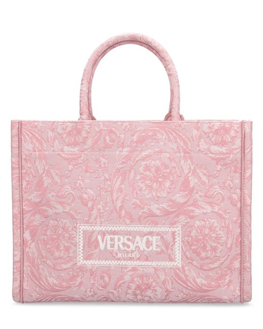 Borsa shopping grande barocco jacquard di Versace in Pink